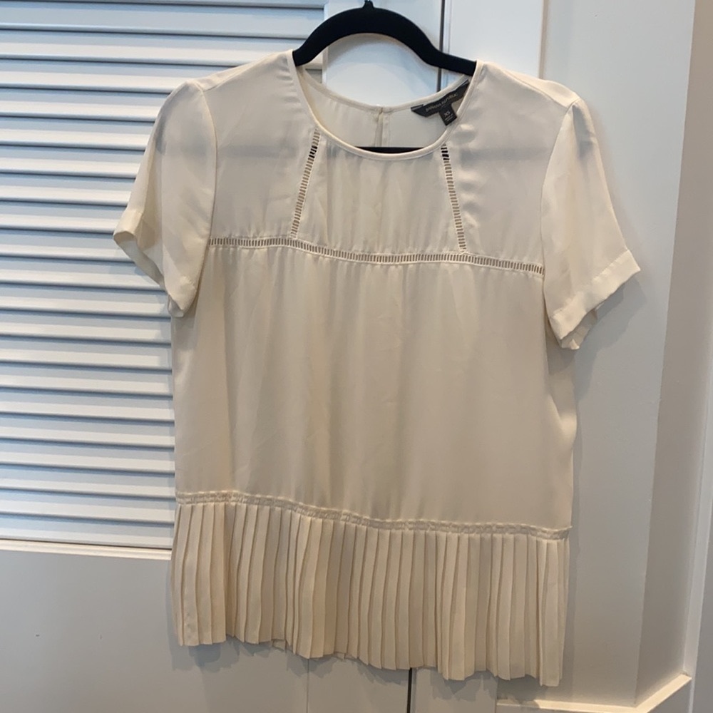 Banana Republic extra small cream blouse with ruffle detail.
